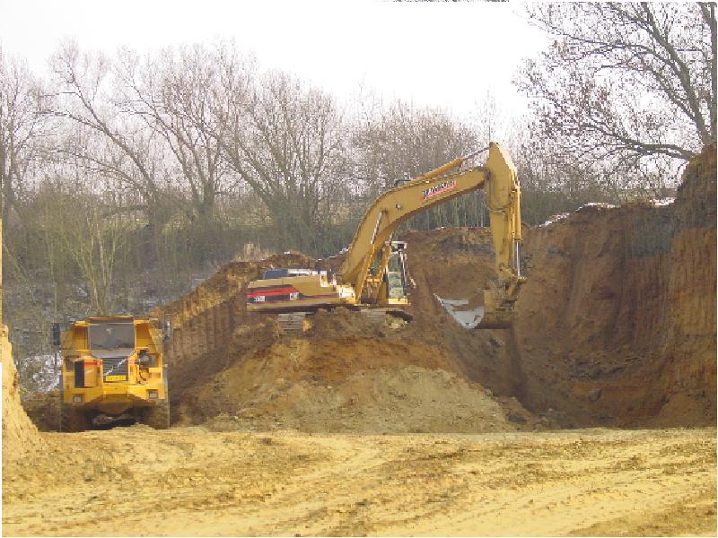 Cat 330B en Volvo A30C.JPG